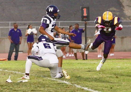 In the Tigers' previous game against Washington Union, Elijah Daley blocks a Washington Union extra point. The Tigers won their opener and will face Kingsburg in a non-league game Friday night at Kingsburg High School.